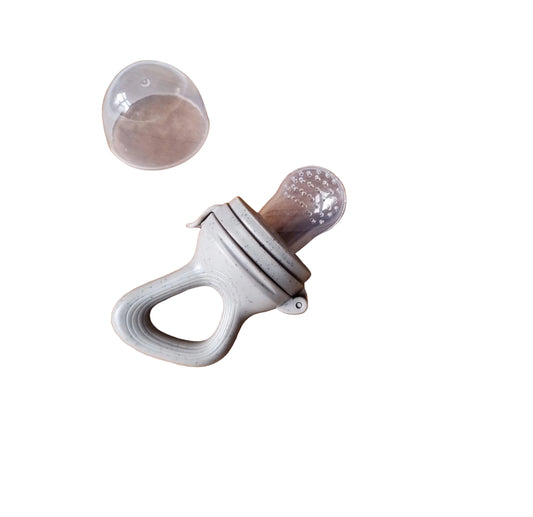 Grignoteuse à fruits sable à pois en silicone - Rammelaartje